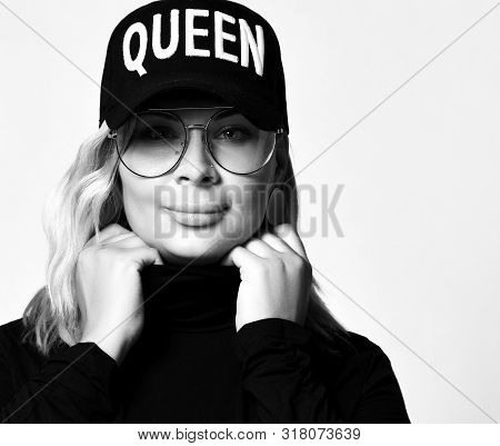 Black And White Portrait Of Modern Woman Blonde In Black Cap And Stylish Big Round Metal-framed Glas