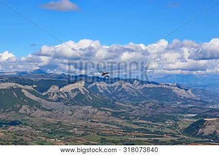 Hang Glider Flying On The Chabre Mountain, France