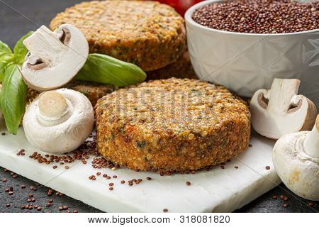 Tasty Vegetarian And Vegan Burgers Made From Healthy Quinoa, Basil, Tomatoes And Champignon Mushroom