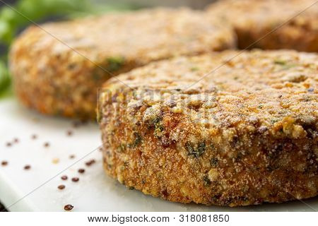 Tasty Vegetarian Burgers Made From Healthy Quinoa, Basil, Tomatoes And Mozzarella Cheese
