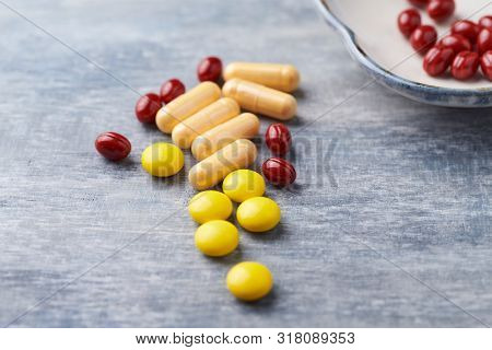 Coenzyme Q10 Capsules, Vitamin C And Beta-carotene Tablets. Antioxidants. Concept For A Healthy Diet