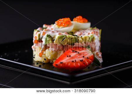 Round Salad Made Of Red Fish Potato And Avocado