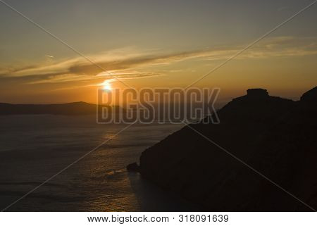 Sunset Behind Skaros Rock In Santorini; Greece