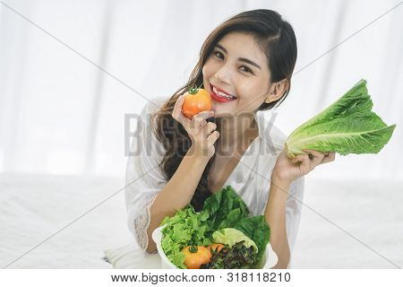 Beautiful Asian Woman With Healthy Food. Heathy Life Style And Beautiful Skin Care Food Concept.