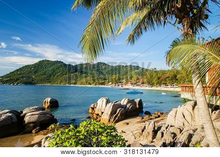 Relax On A Deserted Beach In An Island Of Tropical Paradise. Sand Sairee Beach  With Huge Stones  At