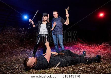 Two Gangsters And Brutal Man In A Field. Photoshoot About Life Of Gungsters In Russia