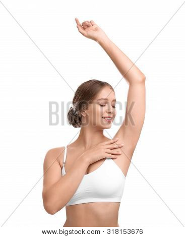 Young Woman With Smooth Clean Armpit On White Background. Using Deodorant