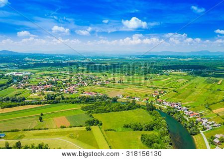 Rural Countryside Landscape In Croatia, Kupa River Meandering Between Agriculture Fields, Shot From 