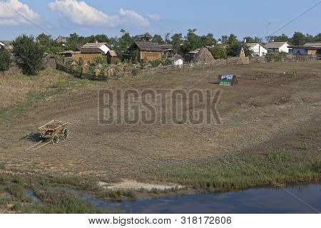Taman, Temryuk District, Krasnodar Region, Russia - July 17, 2019: Landscape At The Pond In The Ethn