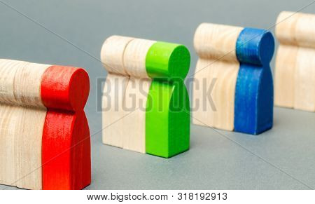 Groups Of Multicolored Wooden People. The Concept Of Market Segmentation. Target Audience, Customer 
