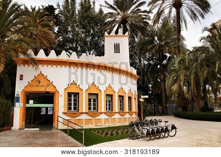 Elche, Alicante, Spain- February 19, 2019: Tourist Office Surrounded By Palm Trees In The Municipal 