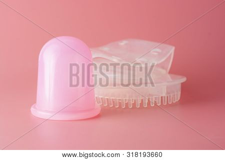 Silicone Massager For Body, Silicone Vacuum Massage Cap Over Pink Background, Copy Spce.