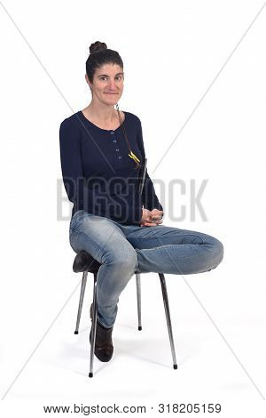 Woman Sitting In A Vintage Chair Isolated On White