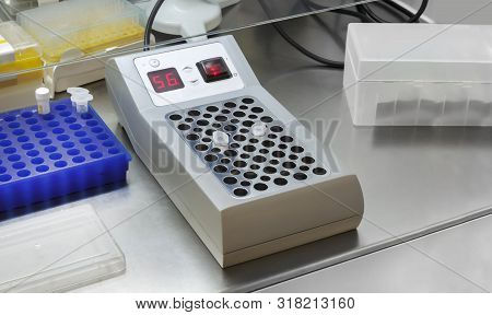 Eppendorf Vials With The Dna Samples In Thermostat In The Genetic Laboratory, Conducting Polymerase 