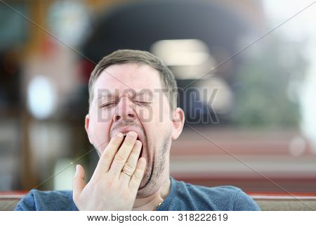 Exhausted Sleepy Male Yawning Facial Portrait. Bored Disheveled Man Closing Gape Mouth With Hand. Dr