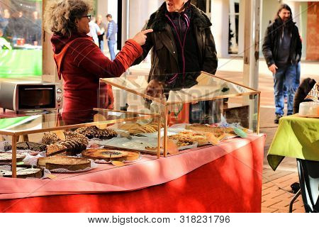 Elche, Alicante, Spain- December 1, 2018: People Buying In The Local Ecological Market In The Main S