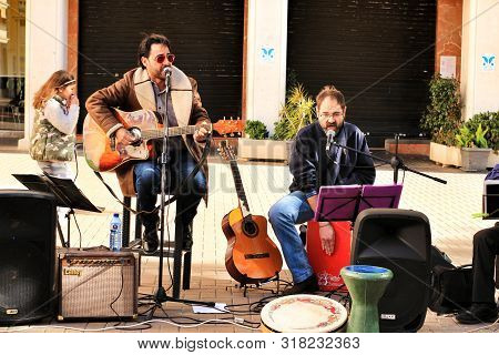 Elche, Alicante, Spain- December 1, 2018: Musicians Playing At The Local Ecological Market In The Ma