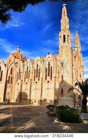 Novelda, Alicante, Spain- November 28, 2018: Details, Archs, Tower And Tiles Of Sanctuary Of Santa M