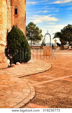 Novelda, Alicante, Spain- November 28, 2018: Details, Archs, Tower And Tiles Of Sanctuary Of Santa M