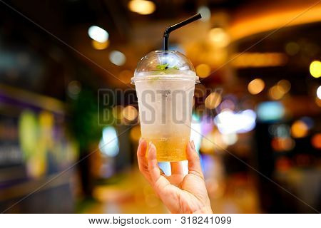 The Refreshment Beverage Mixed Tamarind Soda In Hand