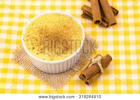 Brazilian Sweet Corn Cream, Dessert, Canjica Or Jimbelê, Dessert Cured Corn Corn Mousse With Cinnamo