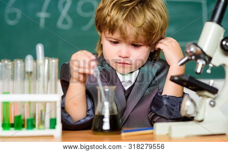 Science Concept. Gifted Child And Wunderkind. Kid Study Chemistry School. School Education. Explore 
