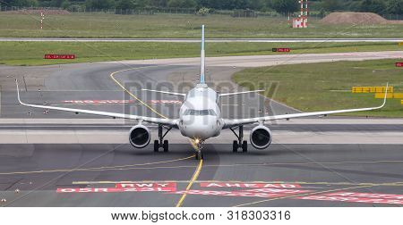 Airplane Taxi In Dusseldorf Airport