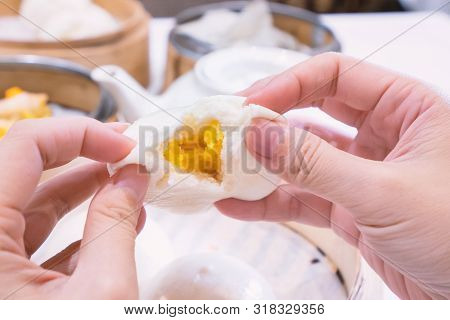 Delicious Dim Sum, Famous Cantonese Food In Asia, Fresh And Hot Salted Creamy Custard Buns In Bamboo