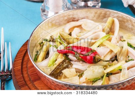 Mediterranean Noodle Soup With Colmar Rings, Onions, Cucumbers And Hot Peppers