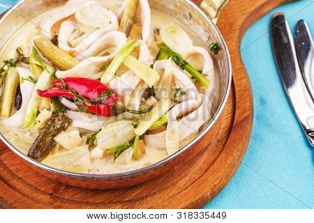 Mediterranean Noodle Soup With Colmar Rings, Onions, Cucumbers And Hot Peppers