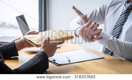 Anti Bribery And Corruption Concept, Business Man Refusing And Don't Receive Money Banknote In Envel
