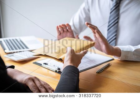 Anti Bribery And Corruption Concept, Business Man Refusing And Don't Receive Money Banknote In Envel