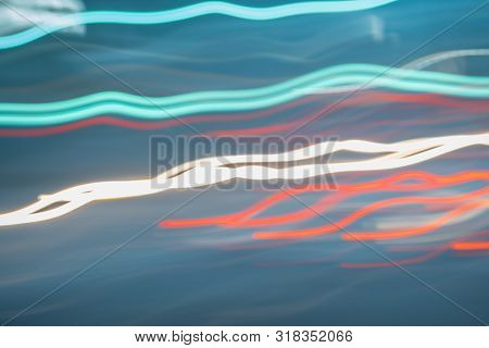 Abstract Bright Blurred Neon Trend Background, Multi-colored Lines. Speed Light Beam Night Traffic A