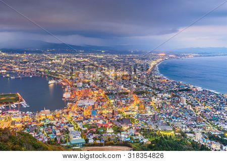 Hakodate, Hokkaido, Japan city skyline from Mt. Hakodate at dusk in autumn season.