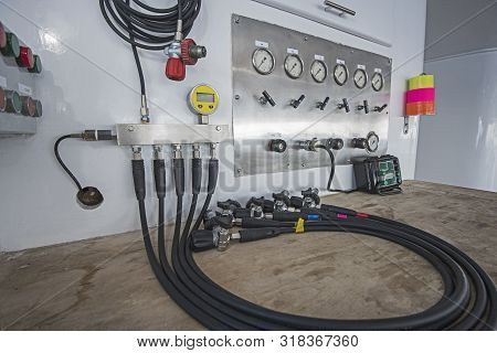 Closeup Of Industrial Trimix Gas Blending Mixing Panel With Hoses Gauges And Analyser