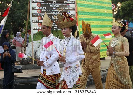A Parade Of Traditional Cultural Costumes By Young People At The 74th Republic Of Indonesia Annivers