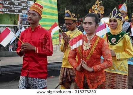 A Parade Of Traditional Cultural Costumes By Young People At The 74th Republic Of Indonesia Annivers