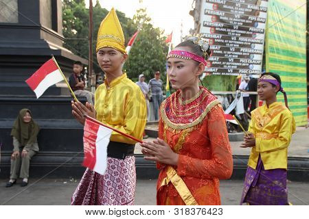 A Parade Of Traditional Cultural Costumes By Young People At The 74th Republic Of Indonesia Annivers