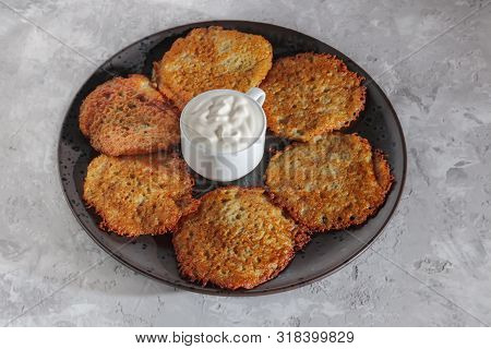 Potato Pancakes. Vegetable Jewish Latkes. Draniki Dish With Sour Cream For Vegetarian Kitchen German