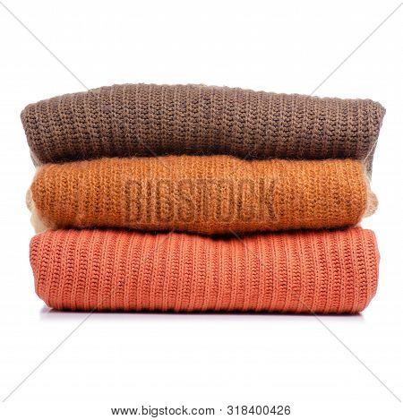 Stack Folded Sweater Clothing On White Background Isolation