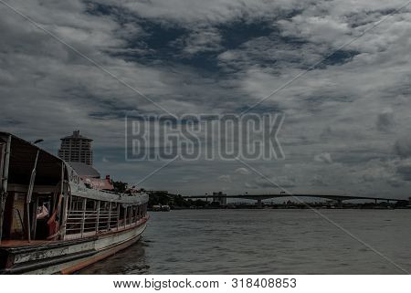 Bangkok, Thailand, 21 Jul 2019: View Of The Chao Phraya Express Boat And Krung Thep Bridge In The Ba