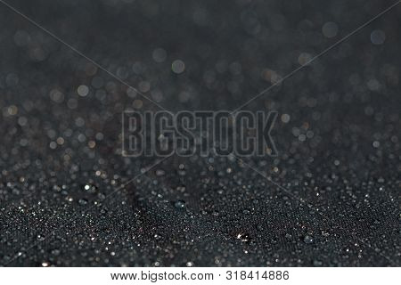 Dark Gray Waterproof Hydrophobic Flat Cloth Closeup With Rain Drops Selective Focus Background