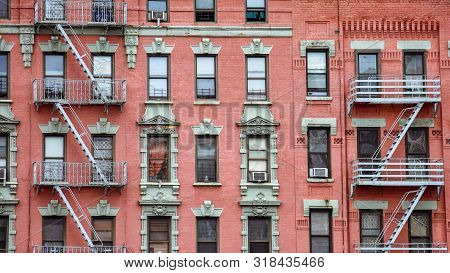 Red Brick Facade, And Fire Stairs. Harlem, Nyc.