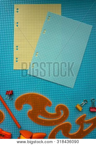 Back To School Concept. Sudent Tools On Blue Background.