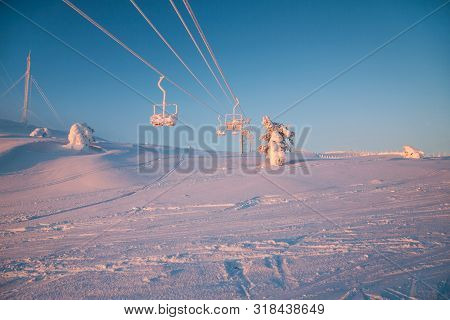 Winter Mountains Panorama With Ski Slopes And Ski Lifts Near Vogel Ski Center, Slovenia