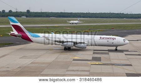 Airplane Taxi In Dusseldorf Airport