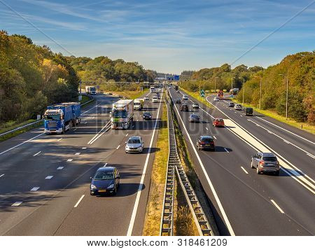 Afternoon Motor Traffic On The A12 Motorway Seen From Above. This Is One Of The Bussiest Highways In