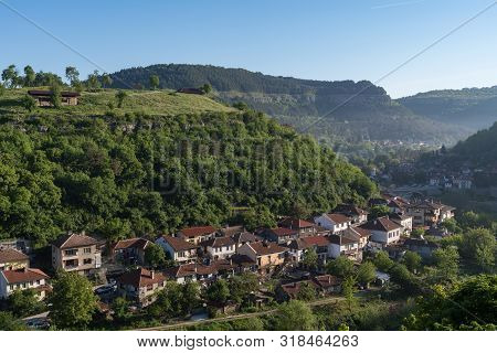 View To Trapezitsa Fortress Hill And Old Town In Banks Of River Yantra, Veliko Tarnovo In Bulgaria.