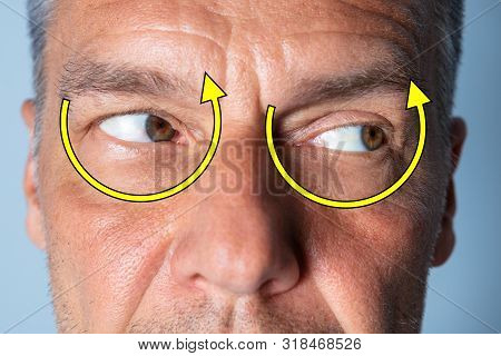 Man Doing Shifting Eye Exercise To Improve Vision