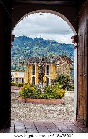 Turmeque, Colombia - August, 2019: Statue Of The Virgin Mary And Jesus In Front Of The Chapel Our La